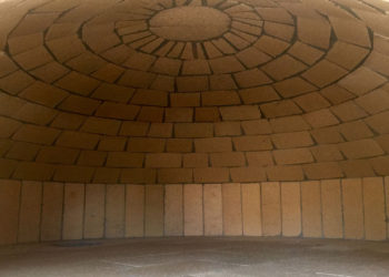 A brick dome in a pizza oven crafted by Forno Nardona.