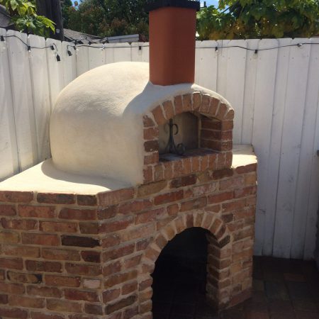 Nardona Rustico wood fired pizza oven with old Chicago brick opening and base in Miami, Fl.
