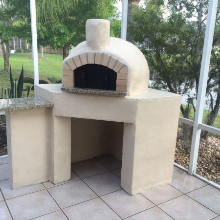 Nardona Rustico Oven on custom based with side prep station in cream color.
