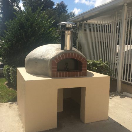 Large Nardona Rustico oven on custom concrete block base.