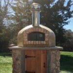 This outdoor pizza oven is a Nardona Rustico Model hand-crafted by Forno Nardona.