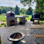 Forno Nardona's traditional pizza oven completes this outdoor kitchen.