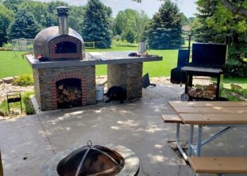 Forno Nardona's traditional pizza oven completes this outdoor kitchen.