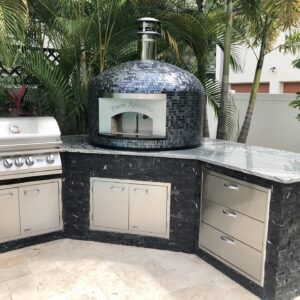 Forno Nardona outdoor kitchen complete with Lion Grill and accessories and a Forno Nardona Napoli oven with face plate engraved "Buon Appetito".