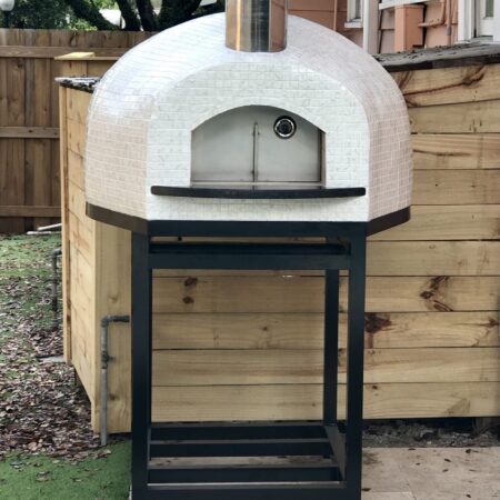 White tiled Forno Nardona Rustico pizza oven on black powder coated stand.
