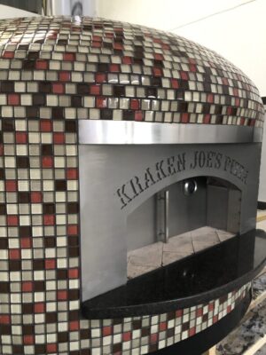 48" Commercial Nardona Napoli oven in multi color tile engraved Kraken Joe's Pizza